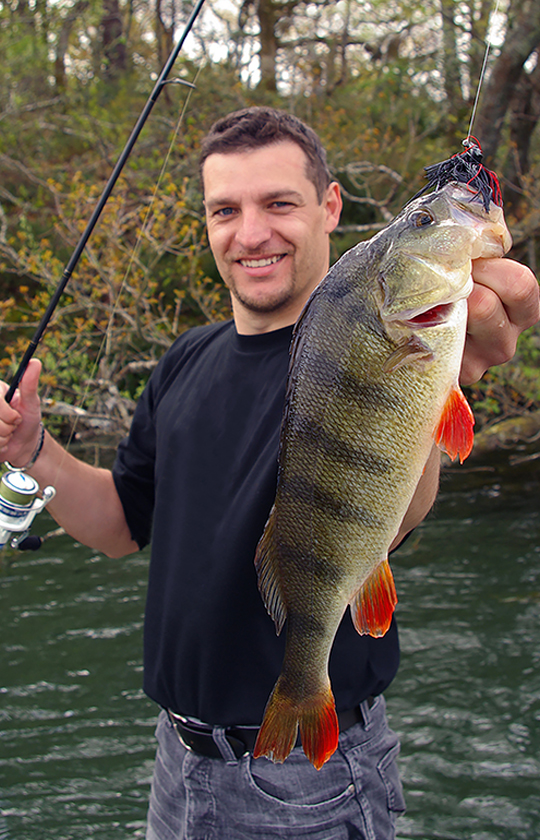 reel-hold-man-catching-fish